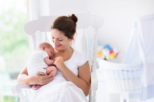 Mother and newborn baby in postpartum period